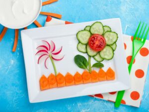 Kids food. Funny vegetable salad for kids. Healthy food with vegetables